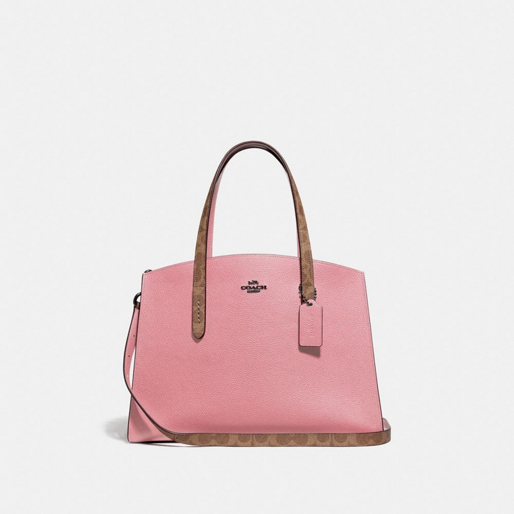 Coach charlie carryall pink discount