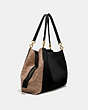 COACH®,DALTON 31 WITH SIGNATURE CANVAS BLOCKING,Coated Canvas,Large,Brass/Tan Black,Angle View