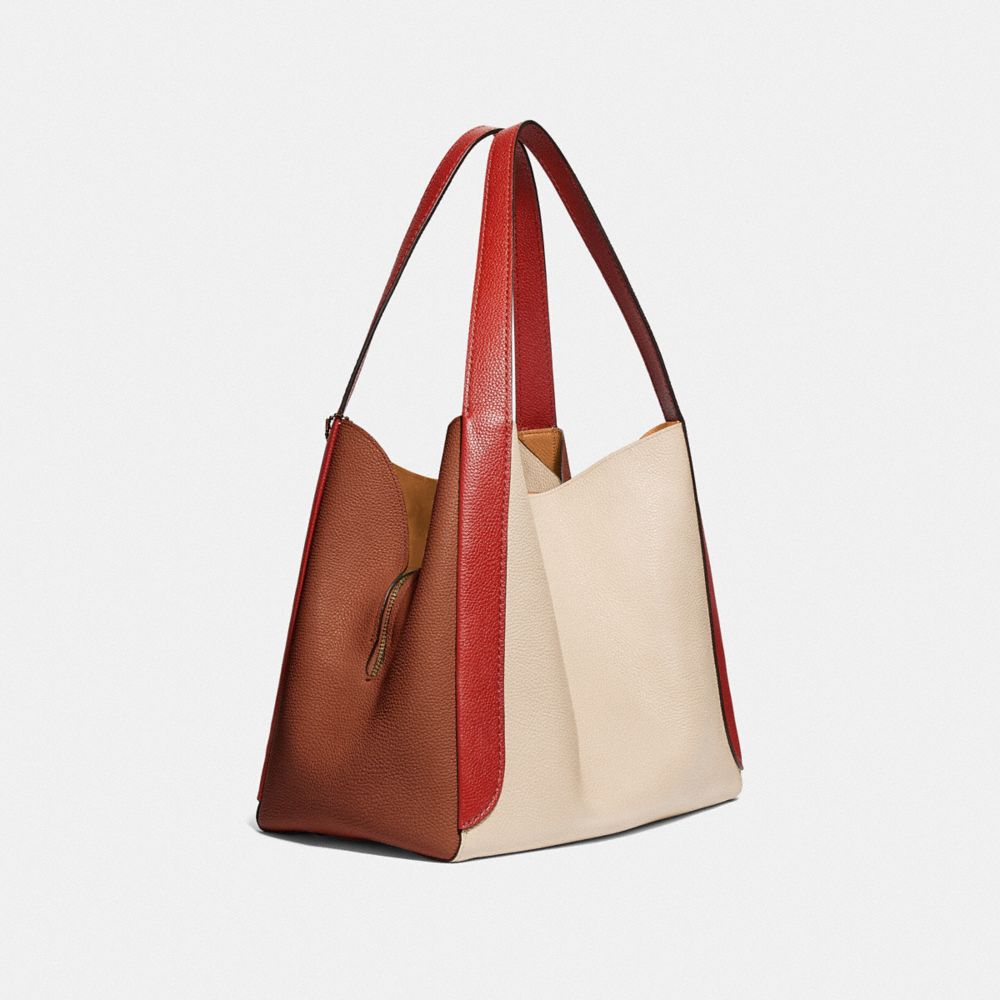 COACH®,HADLEY HOBO IN COLORBLOCK,Pebble Leather,X-Large,Brass/Ivory Red Sand Multi,Angle View