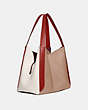 COACH®,HADLEY HOBO IN COLORBLOCK,Pebble Leather,X-Large,Gold/Taupe Red Sand Multi,Angle View