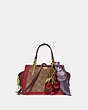 COACH®,DREAMER 21 IN SIGNATURE CANVAS WITH SNAKESKIN DETAIL,pvc,Small,Gold/Tan Red Apple,Angle View