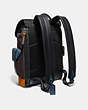 COACH®,RIVINGTON BACKPACK IN COLORBLOCK WITH COACH PATCH,Leather,Large,Black Copper/Moss Multi,Angle View