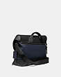 COACH®,RIVINGTON BIKE BAG WITH SIGNATURE CANVAS BLOCKING,Leather,Large,Black Copper/Midnight Navy/Charcoal,Angle View