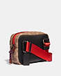 COACH®,ACADEMY L-PACK WITH SIGNATURE CANVAS BLOCKING AND COACH PATCH,Coated Canvas,Black Copper/Khaki,Angle View