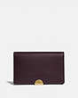 COACH®,DREAMER CARD CASE,Leather,Brass/Oxblood,Front View
