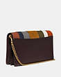 COACH®,CALLIE FOLDOVER CHAIN CLUTCH WITH PATCHWORK STRIPES,Leather,Mini,Brass/Oxblood Multi,Angle View