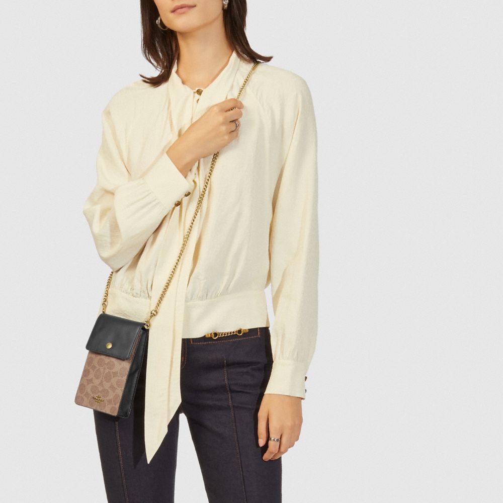 COACH®,Snap Phone Crossbody In Signature Canvas,,Detail View