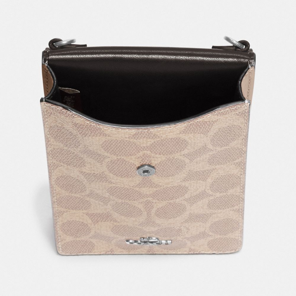 COACH®,Snap Phone Crossbody In Signature Canvas,,Inside View,Top View