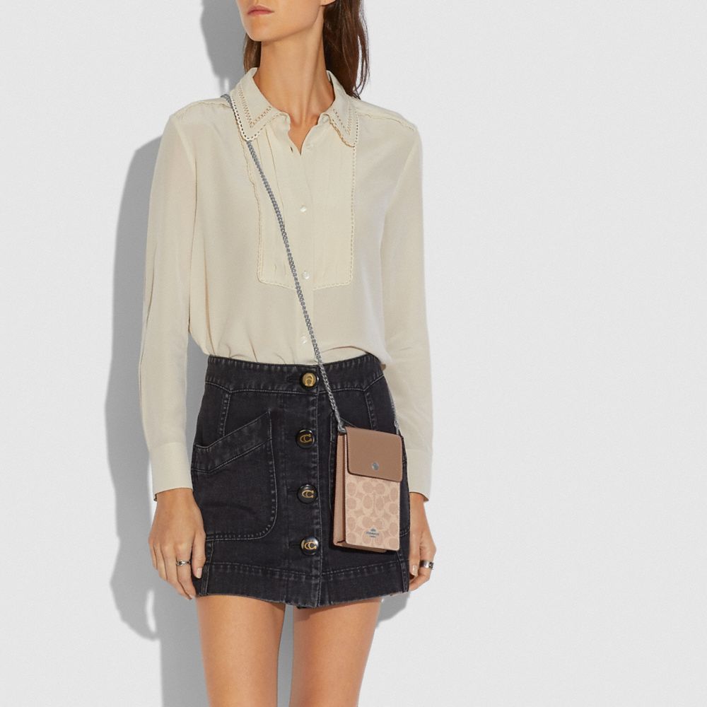 COACH®,Snap Phone Crossbody In Signature Canvas,,Detail View