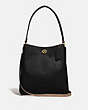 COACH®,CHARLIE BUCKET BAG WITH SIGNATURE CANVAS BLOCKING,Leather,Medium,Brass/Tan Black,Front View