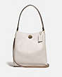 COACH®,CHARLIE BUCKET BAG WITH SIGNATURE CANVAS BLOCKING,Leather,Medium,Brass/Tan Chalk,Front View