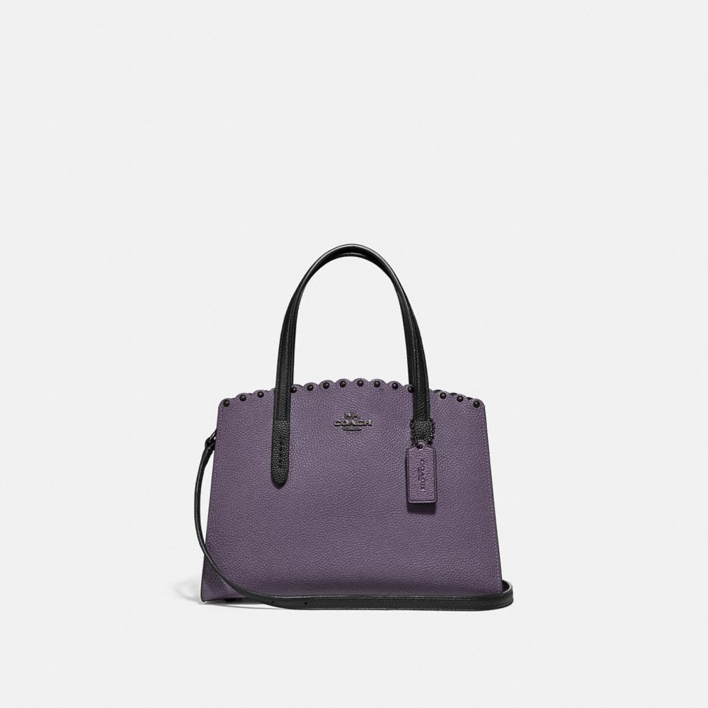 Coach charlie cheap carryall with rivets