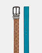 COACH®,HARNESS BUCKLE CUT-TO-SIZE REVERSIBLE BELT, 38MM,Coated Canvas,Tan Signature Multi,Angle View