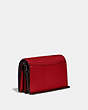 COACH®,CALLIE FOLDOVER CHAIN CLUTCH WITH QUILTING AND RIVETS,Leather,Mini,Pewter/Red Apple,Angle View