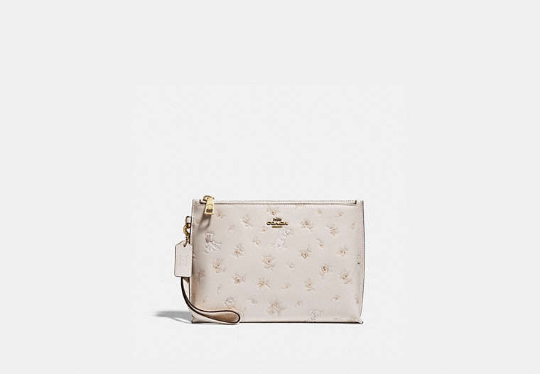 COACH®,DISNEY X COACH CHARLIE POUCH WITH MIXED DALMATIAN PRINT,Smooth Leather,Brass/Chalk,Front View