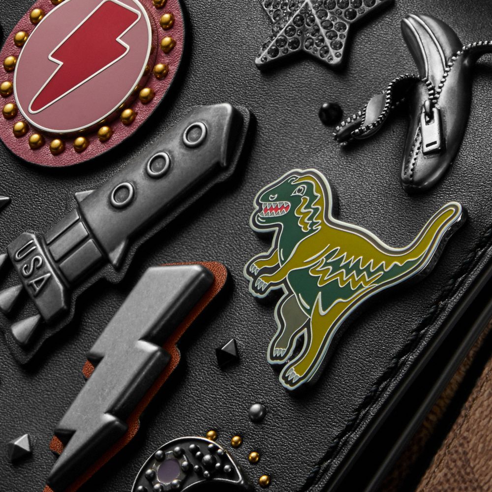Dinky With Signature Canvas Detail And Souvenir Pins