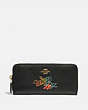 COACH®,WIZARD OF OZ BOXED SLIM ACCORDION ZIP WALLET WITH MOTIF,Pebble Leather,Gold/Black,Front View