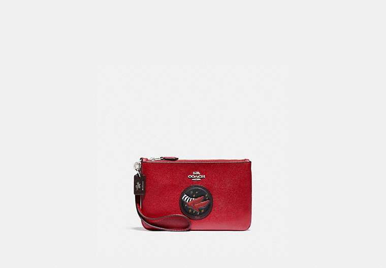 COACH®,WIZARD OF OZ BOXED SMALL WRISTLET WITH MOTIF,Pebble Leather,Silver/Red Apple,Front View