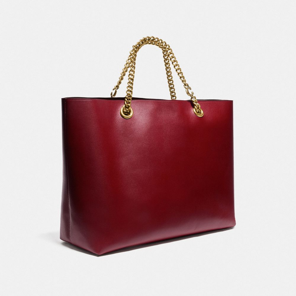 COACH®,SIGNATURE CHAIN CENTRAL TOTE,X-Large,Brass/Deep Red,Angle View