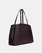 COACH®,CHARLIE CARRYALL 40,Leather,X-Large,Gold/Oxblood,Angle View