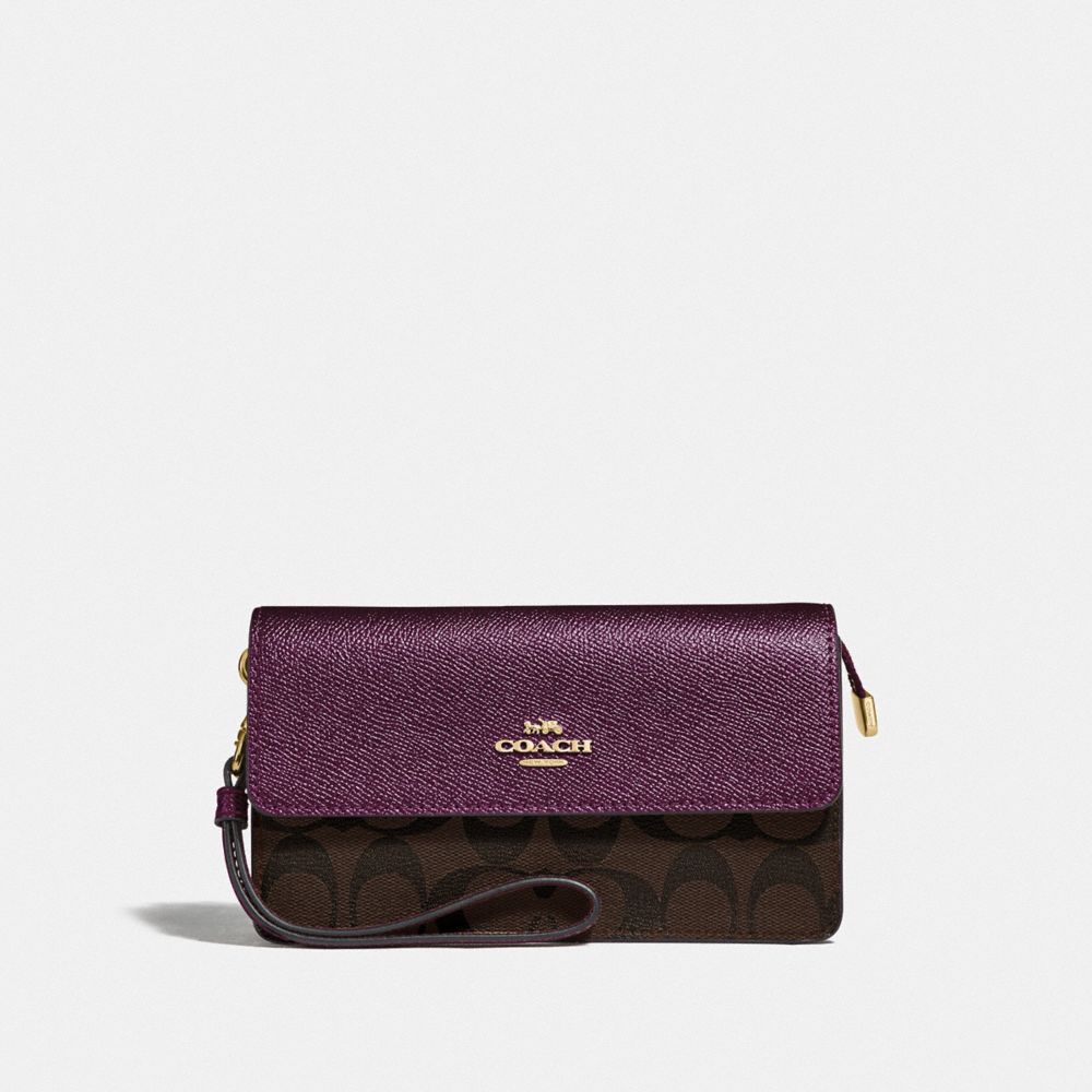 Coach foldover wristlet in signature online canvas