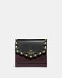 COACH®,SMALL WALLET IN COLORBLOCK WITH SCALLOP RIVETS,Smooth Leather,Brass/Black Multi,Front View