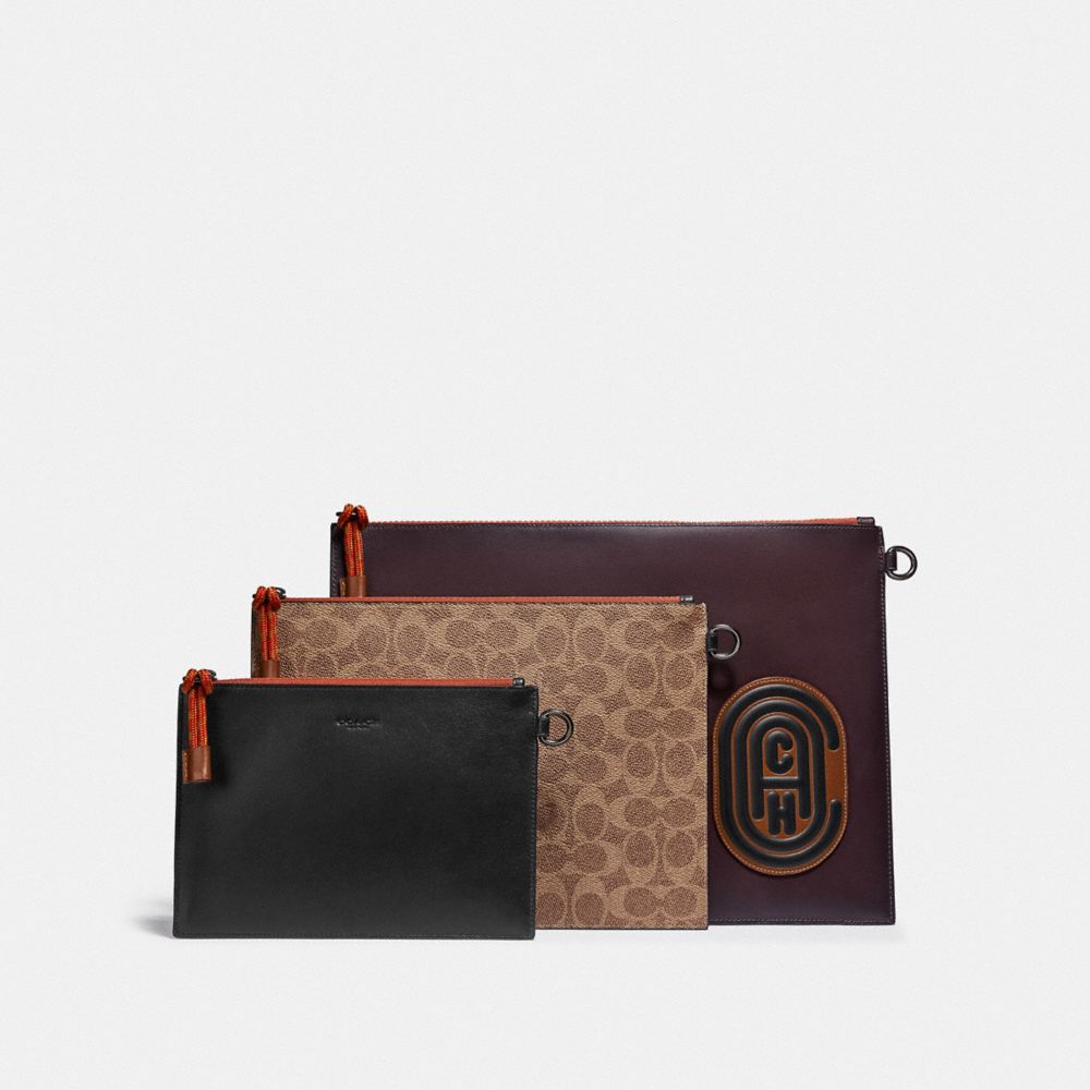 Triple pochette en toile exclusive avec écusson Coach