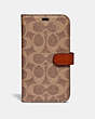 COACH®,IPHONE X/XS FOLIO IN SIGNATURE CANVAS,Coated Canvas,Tan,Front View