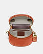COACH®,TRAIL BAG,Leather,Brass/Vermillion,Inside View,Top View