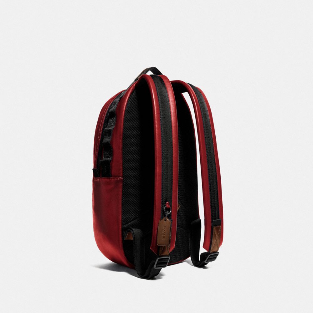COACH®,PACER BACKPACK WITH COACH PATCH,Leather,Large,Black Copper/Cardinal,Angle View