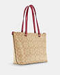 COACH®,GALLERY TOTE BAG IN SIGNATURE CANVAS,Leather,Large,Gold/Light Khaki Rouge,Angle View
