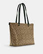 COACH®,GALLERY TOTE IN SIGNATURE CANVAS,Leather,Large,Gold/Khaki/Amazon Green,Angle View