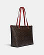 COACH®,GALLERY TOTE BAG IN SIGNATURE CANVAS,Leather,Large,Gold/Brown 1941 Red,Angle View