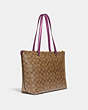 COACH®,GALLERY TOTE BAG IN SIGNATURE CANVAS,Leather,Large,Gold/Khaki/Lilac Berry,Angle View