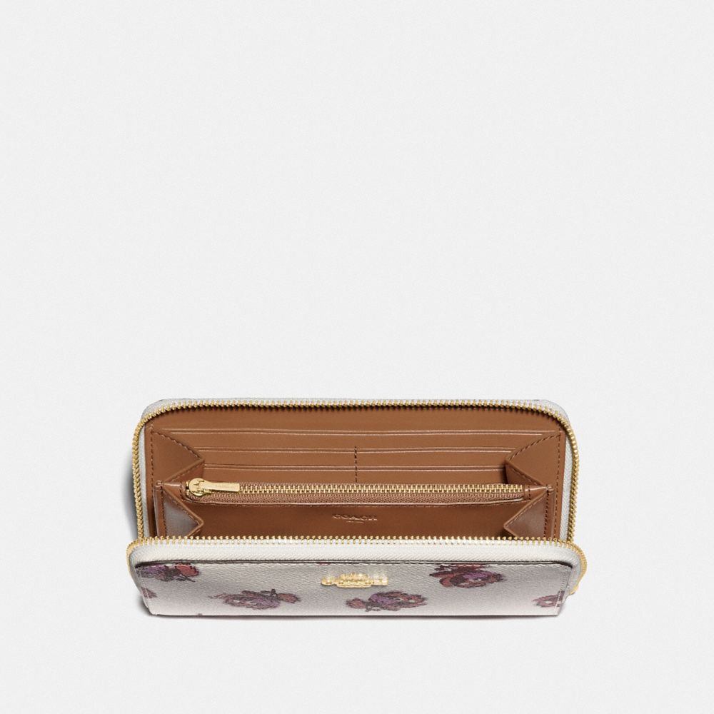 Portefeuille zippé accordéon à imprimé floral