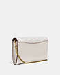 COACH®,TABBY CHAIN CLUTCH IN SIGNATURE CANVAS WITH FLORAL EMBROIDERY,Coated Canvas,Brass/Chalk Multi,Angle View