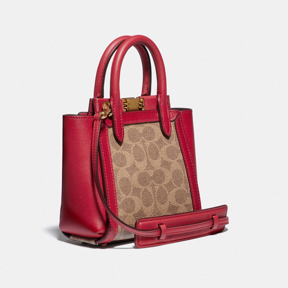 COACH®,TROUPE TOTE 16 IN SIGNATURE CANVAS,Coated Canvas,Medium,Brass/Tan Red Apple,Angle View
