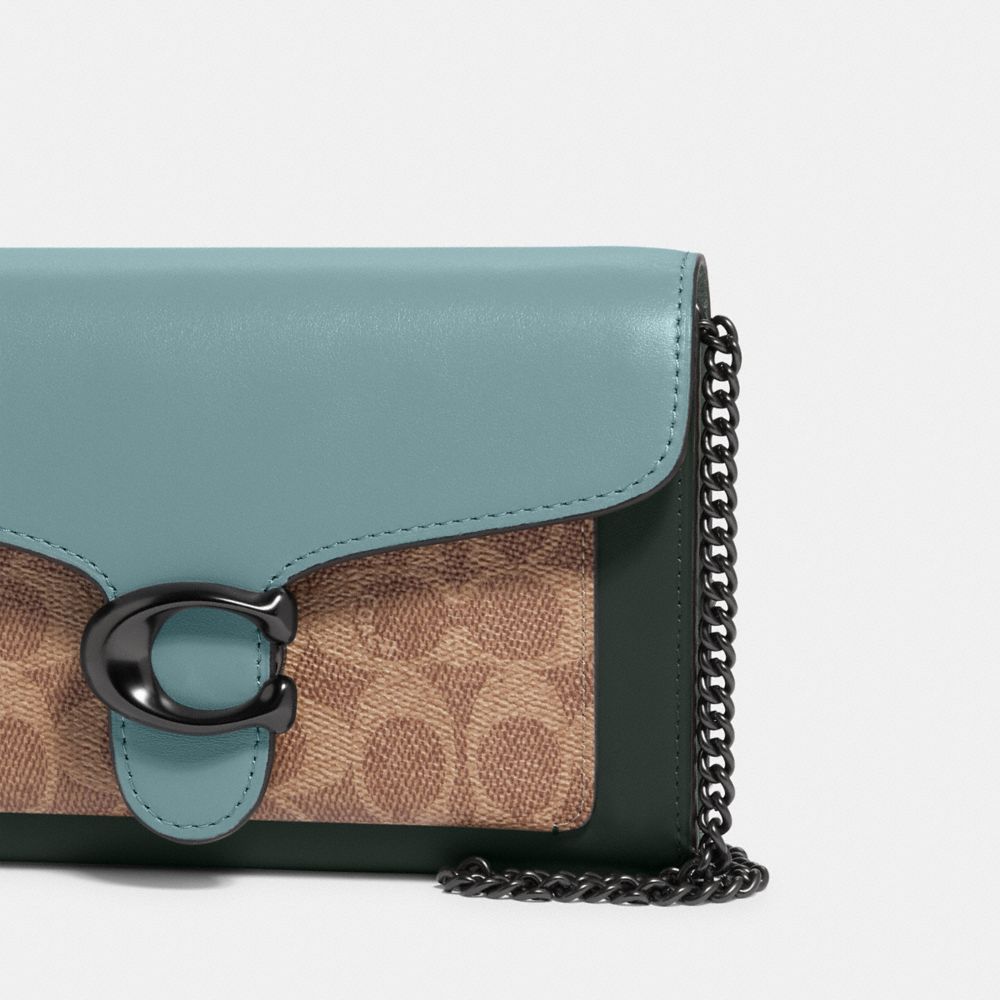 Coach discount signature clutch