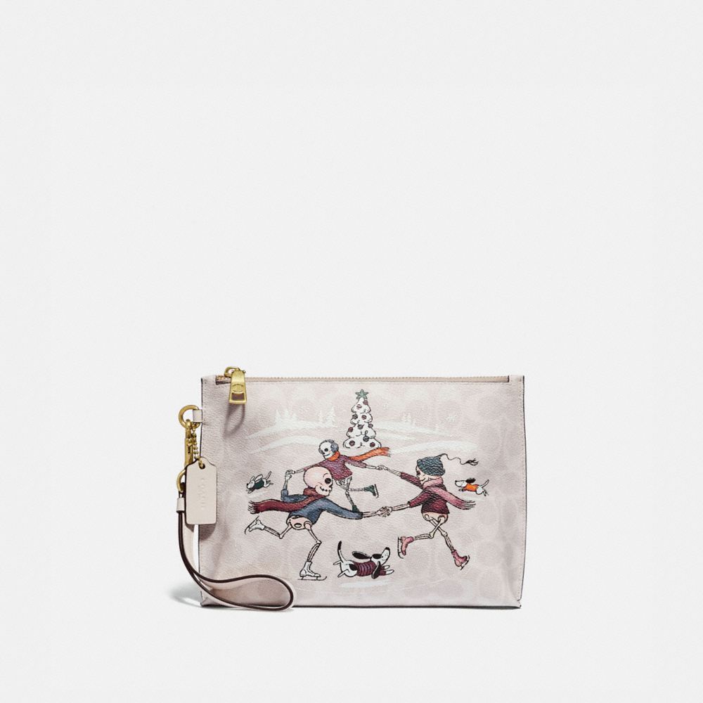 COACH®,CHARLIE POUCH IN SIGNATURE CANVAS WITH BONESY,Signature Coated Canvas,Brass/Ivory Multi,Front View image number 0
