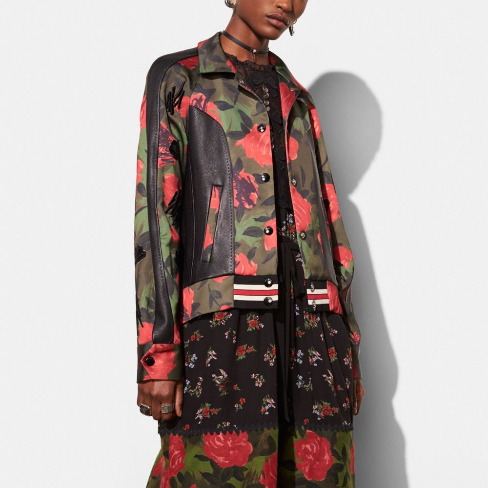 COACH®: Camo Rose Varsity Jacket With Raglan Sleeve