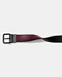 COACH®,HARNESS BUCKLE CUT-TO-SIZE REVERSIBLE BELT, 38MM,Leather,Black/Oxblood,Angle View