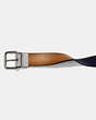 COACH®,HARNESS BUCKLE CUT-TO-SIZE REVERSIBLE BELT, 38MM,Leather,Light Saddle/Midnight,Angle View