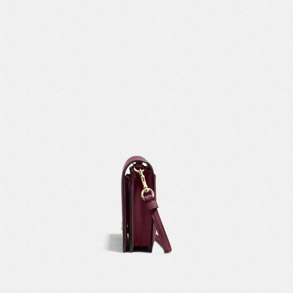 COACH®,HAYDEN FOLDOVER CROSSBODY CLUTCH,Pebbled Leather,Mini,Light Gold/Oxblood,Angle View