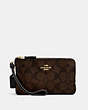 COACH®,DOUBLE CORNER ZIP WRISTLET IN SIGNATURE CANVAS,pvc,Small,Gold/Brown Black,Front View