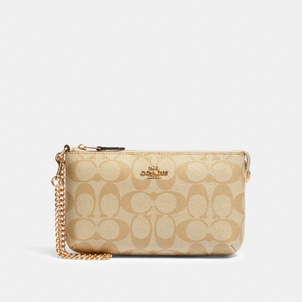 Grand wristlet en toile signature