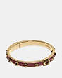 COACH®,PEGGED SIGNATURE BANGLE,Metal,Gold/Wine,Front View