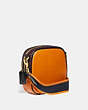 COACH®,KAT CAMERA BAG IN COLORBLOCK,Embossed Leather,Brass/Saffron Multi,Angle View