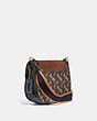 COACH®,KAT SADDLE BAG 20 WITH HORSE AND CARRIAGE PRINT,Coated Canvas/Suede,Small,Brass/Brown Black,Angle View