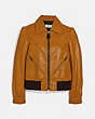 COACH®,LEATHER TAILORED BOMBER JACKET WITH PIECING,Leather,SAFFRON,Front View