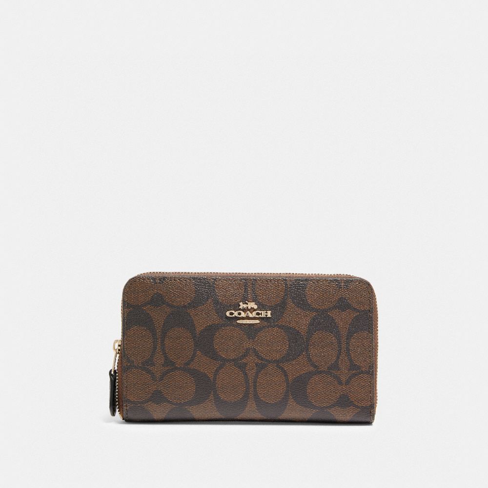 Coach Slim Zip Wallet In Signature Canvas